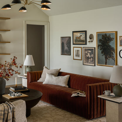 Equestrian Study on a gallery wall above a sofa