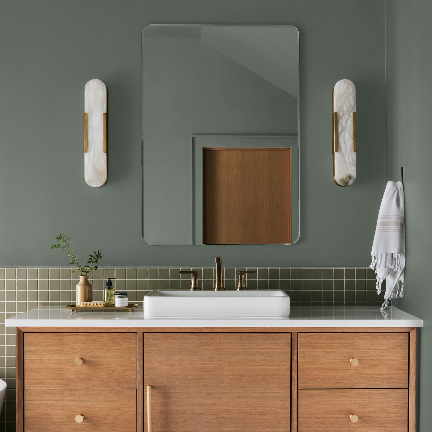 dark green-grey interior paint named luxe shown painted on bathroom wall