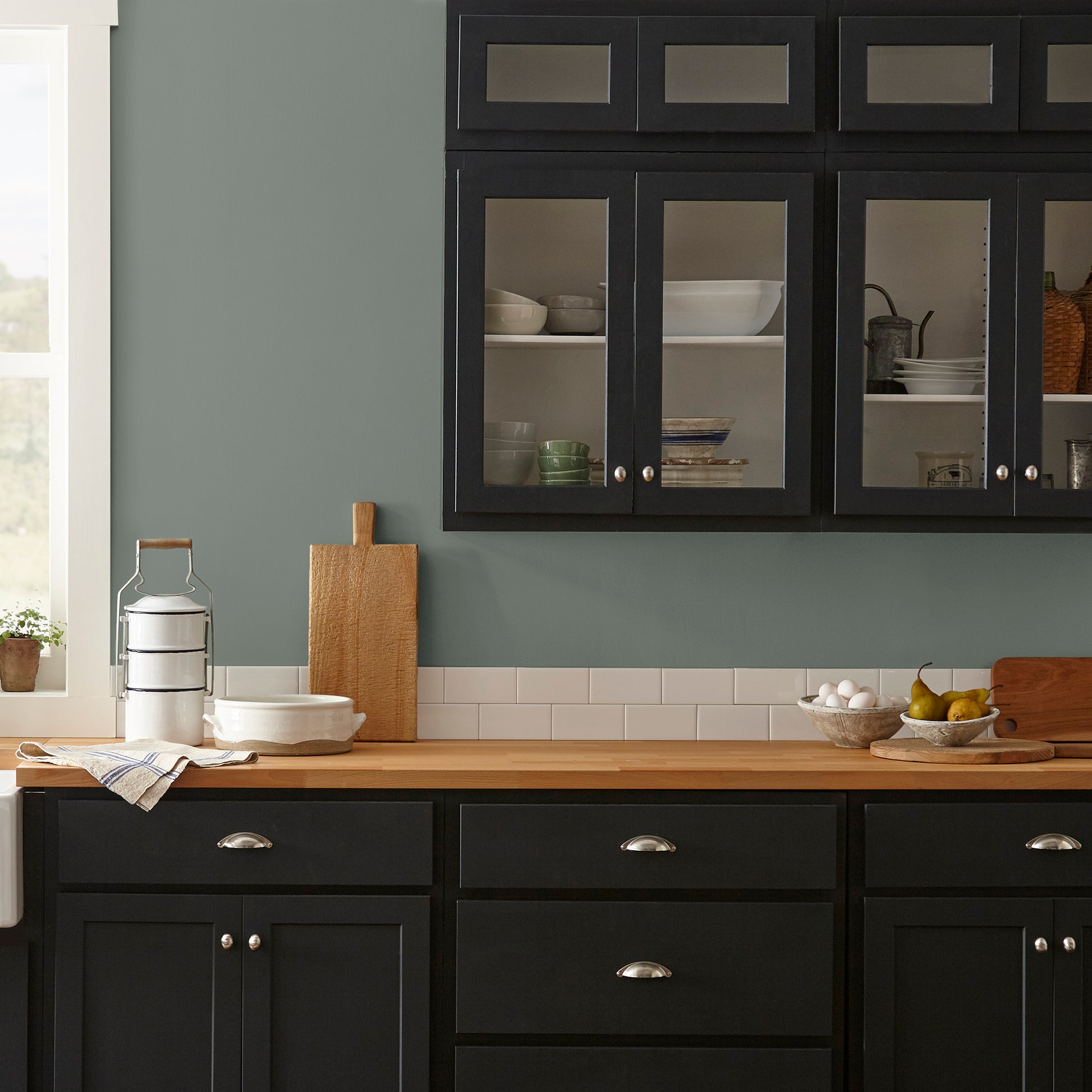 dark green-grey interior paint named luxe shown painted on kitchen wall