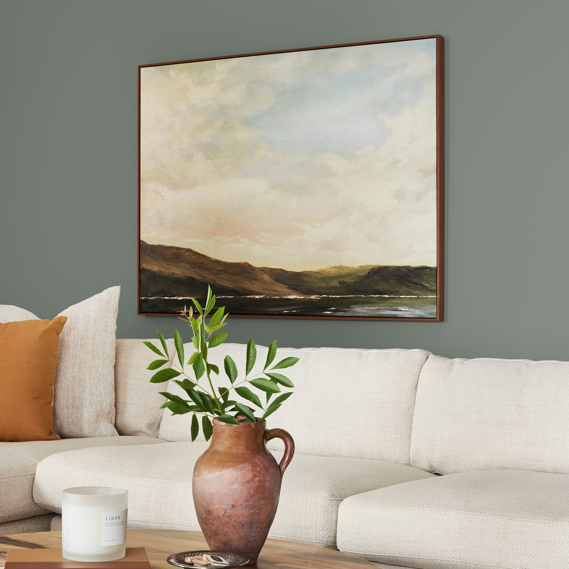 dark green-grey interior paint named luxe shown painted on living room wall