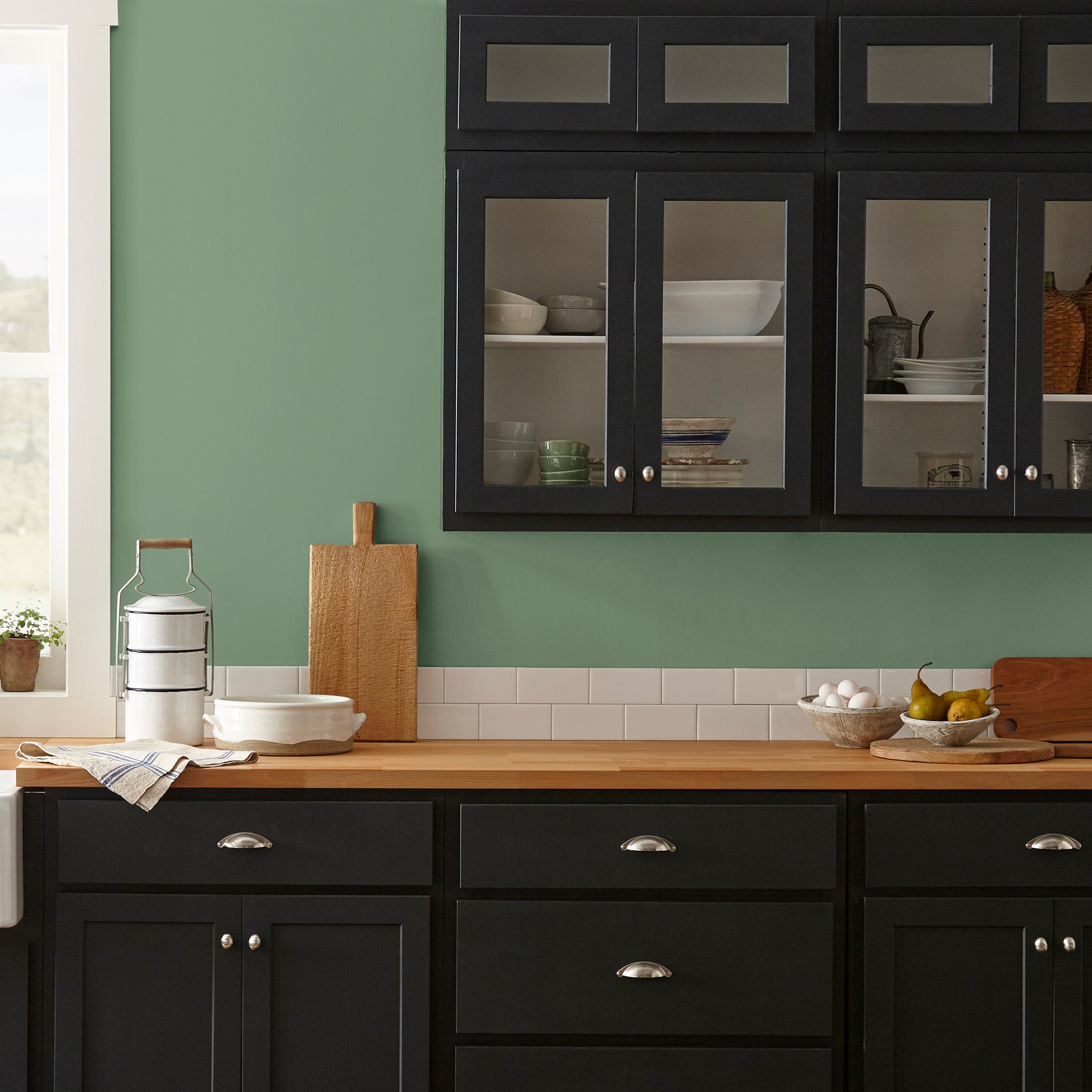 evergreen green paint named magnolia green shown painted on kitchen wall