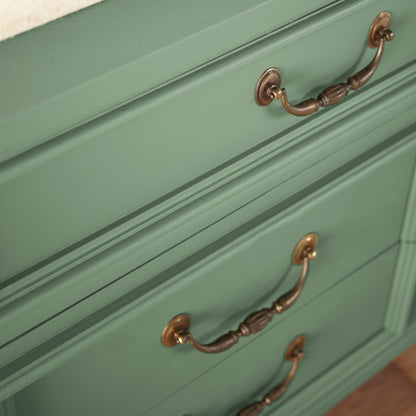 Bold and crisp green trim, door and cabinetry paint named Magnolia Green shown painted on cabinet