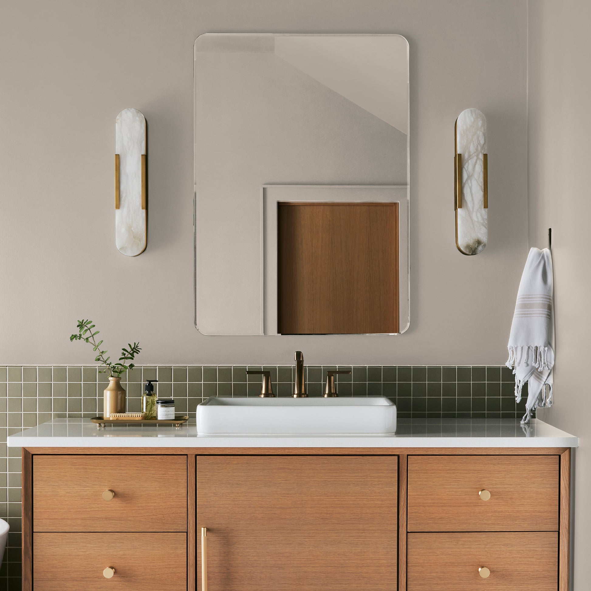 Oatmeal white with peach undertones interior paint named soft linen shown painted on bathroom wall