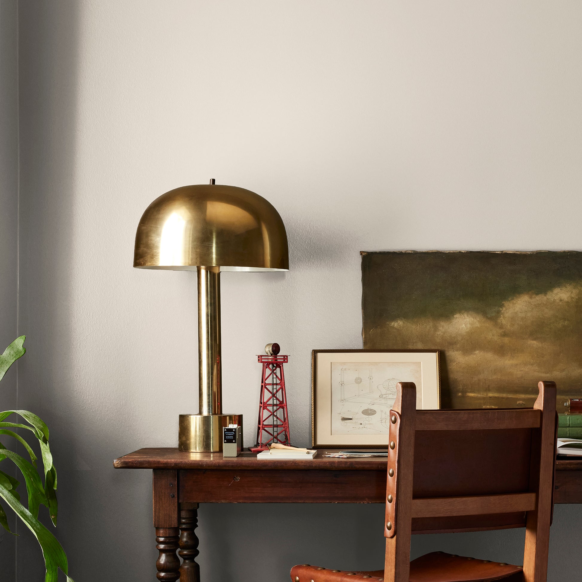 Oatmeal white with peach undertones interior paint named soft linen shown painted on bedroom wall
