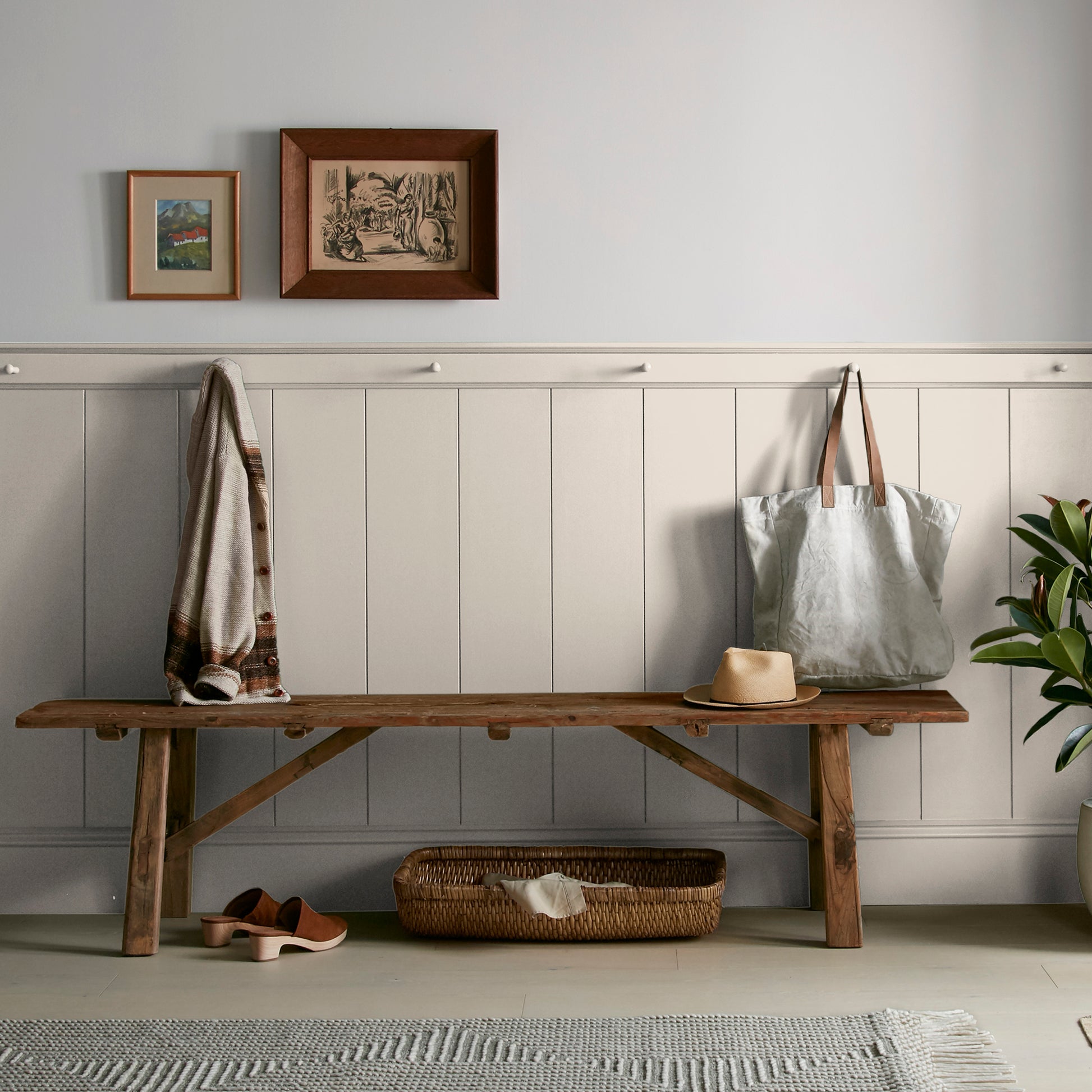 Oatmeal white with peach undertones interior paint named soft linen shown painted on entryway wall