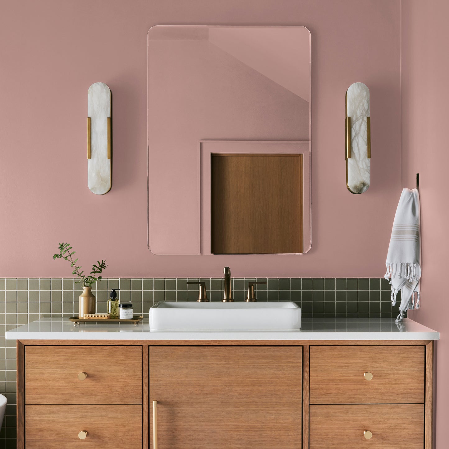 light salmon pink paint named cabbage rose shown painted on bathroom wall
