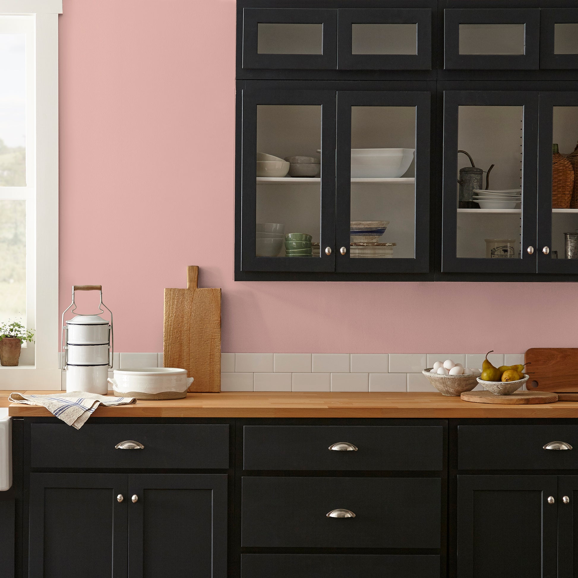 light salmon pink paint named cabbage rose shown painted on kitchen wall