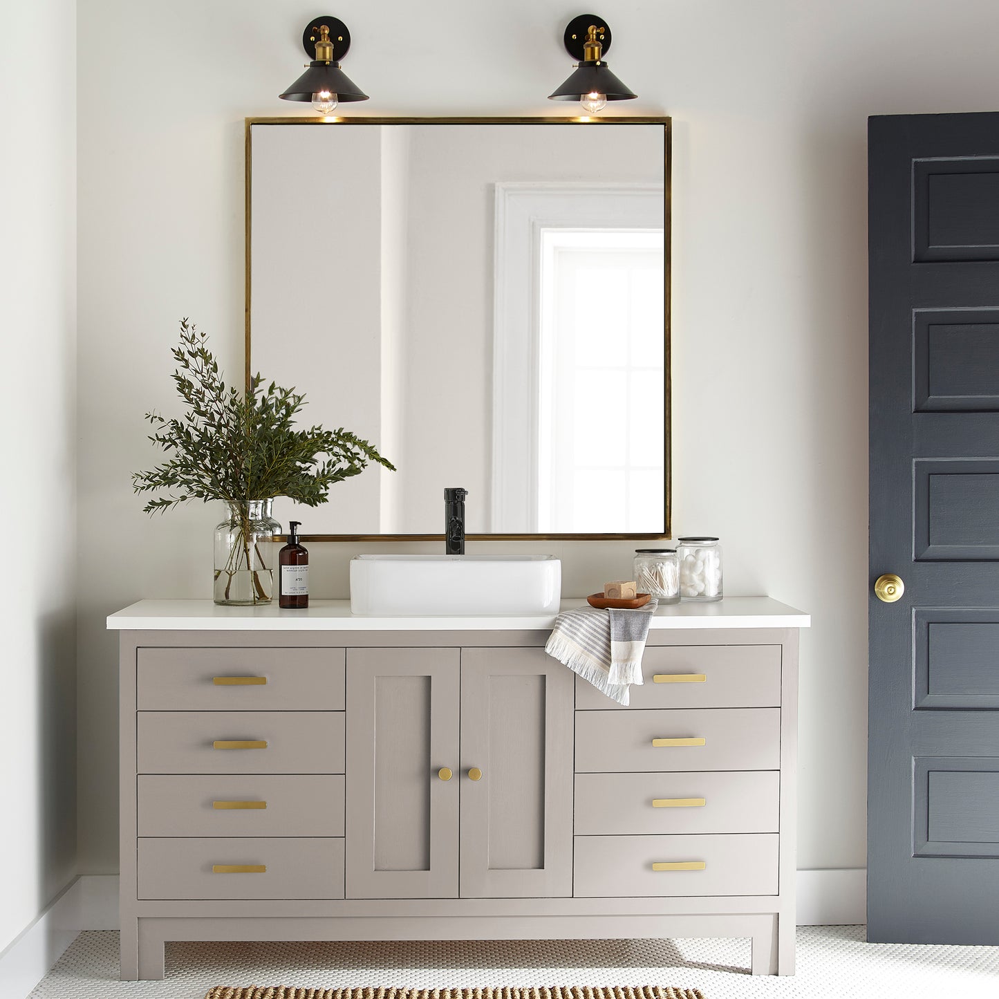 Sandy tan with pink door and cabinet paint named cinnamon sugar shown painted on bathroom cabinet