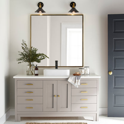 Sandy tan with pink door and cabinet paint named cinnamon sugar shown painted on bathroom cabinet