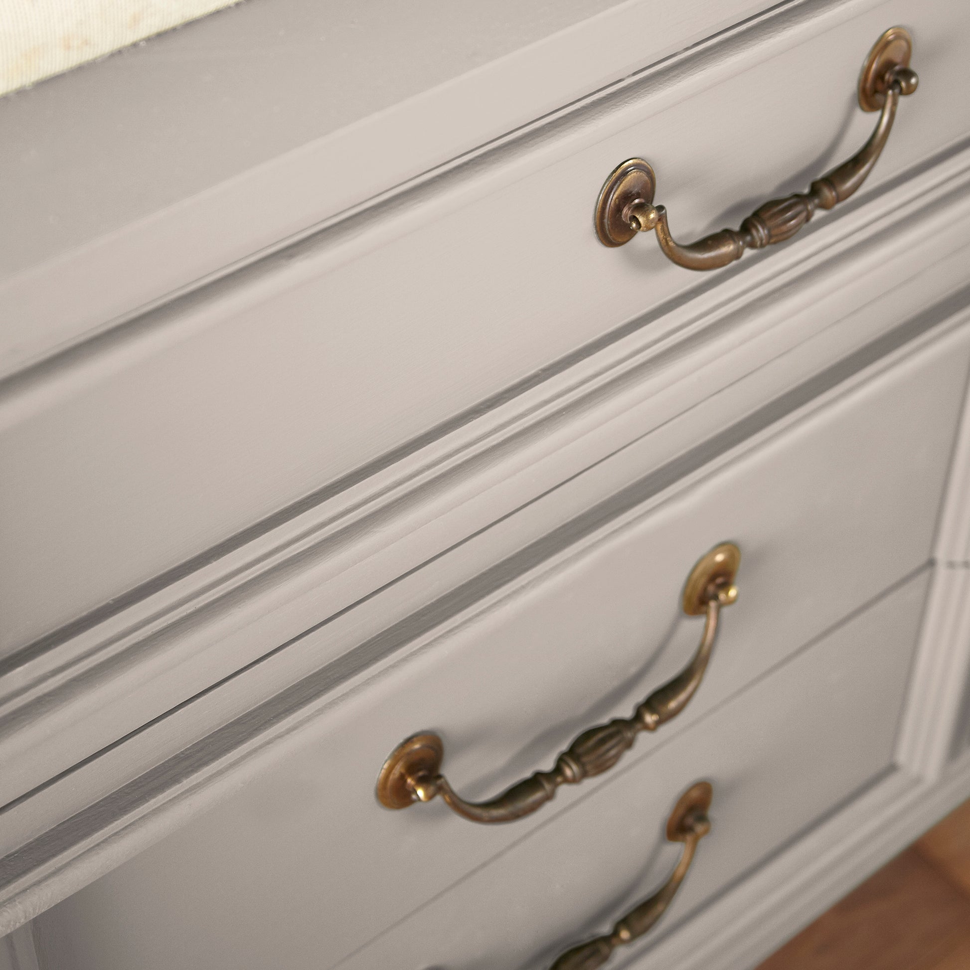 Sandy tan with pink door and cabinet paint named cinnamon sugar shown painted on cabinet