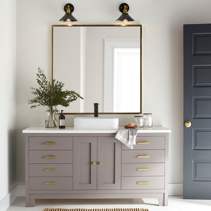  A mid-tone mauve  door and cabinet paint named homebody shown painted on bathroom cabinet