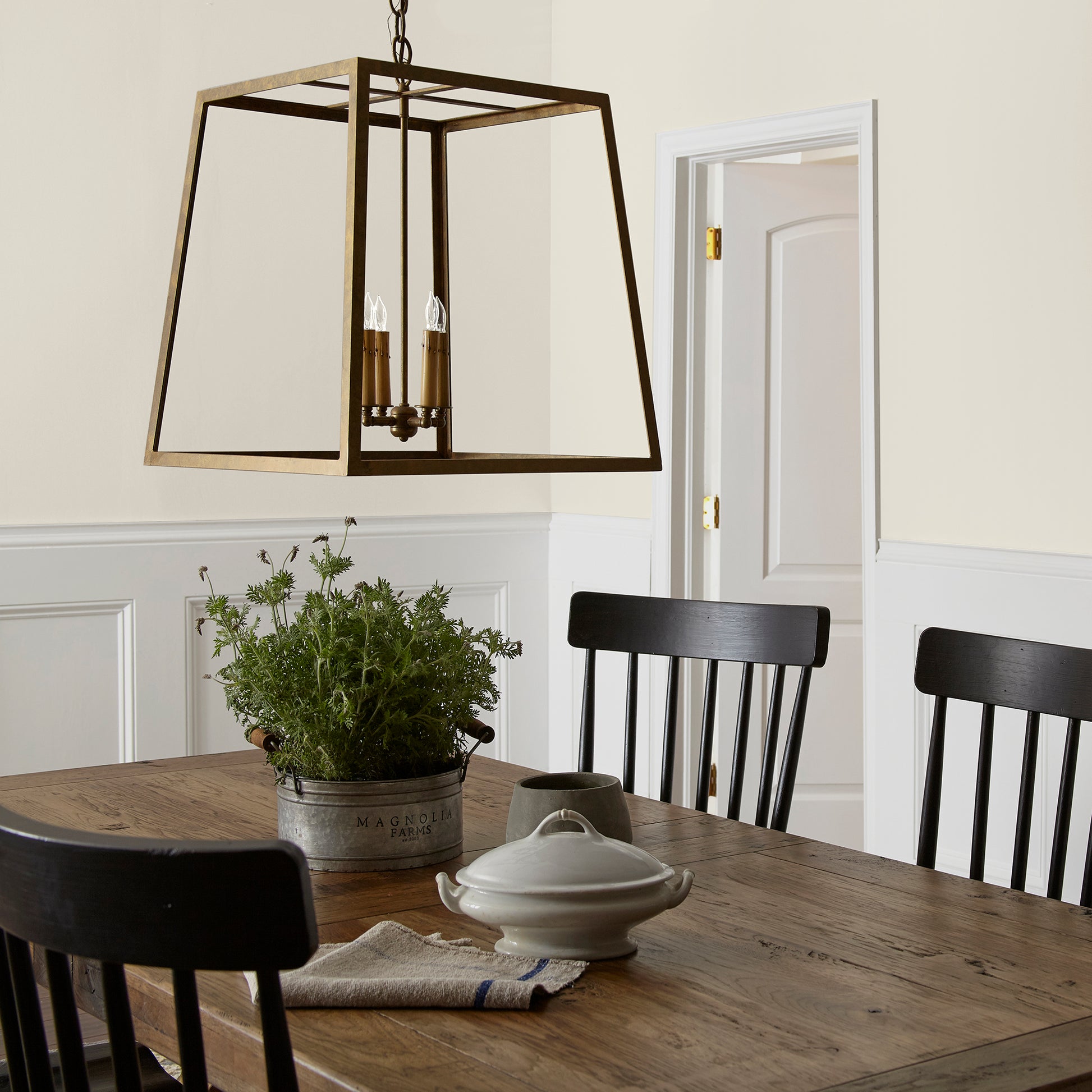 A bleached beige interior paint named pearly cotton shown painted on dining room wall