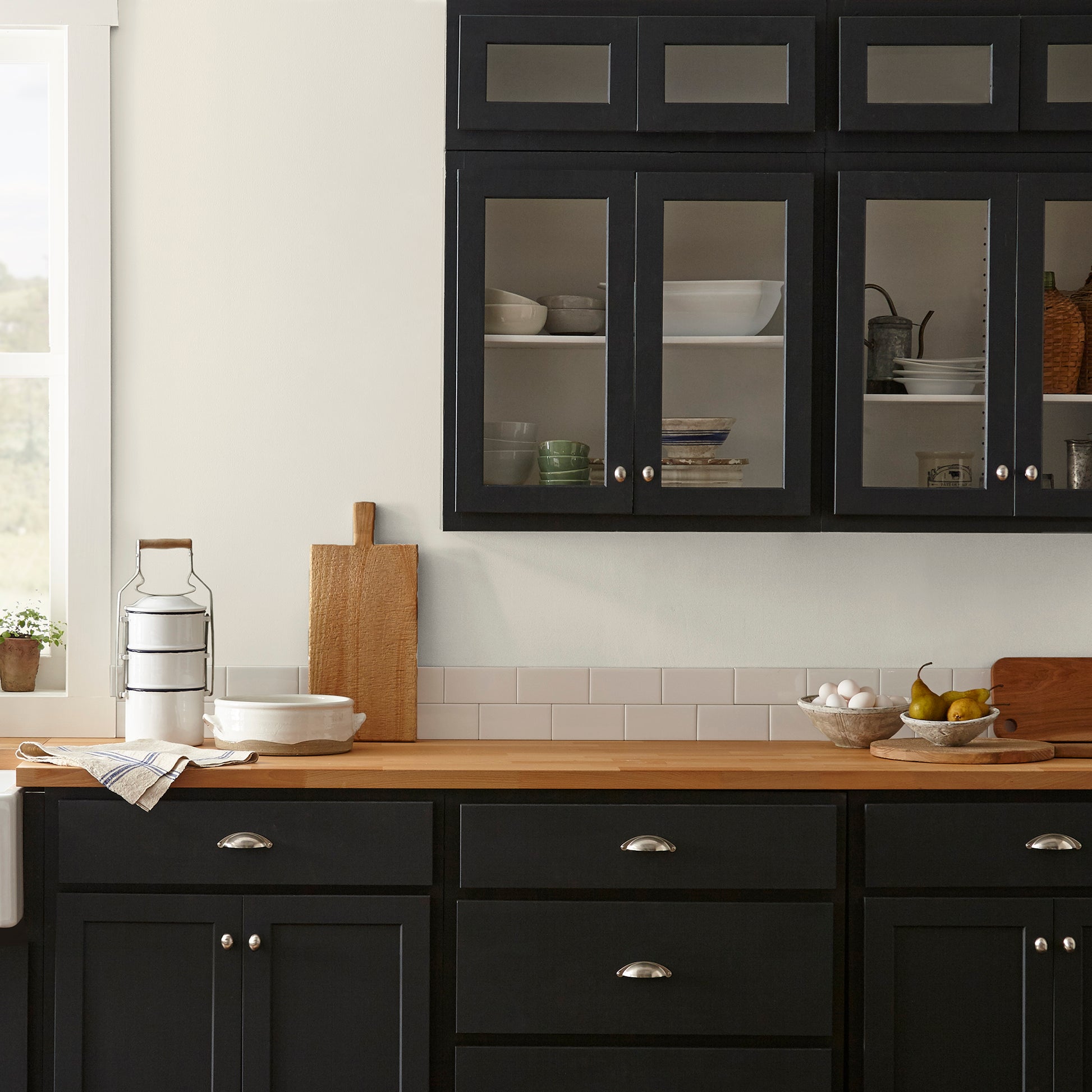 A bleached beige interior paint named pearly cotton shown painted on kitchen wall