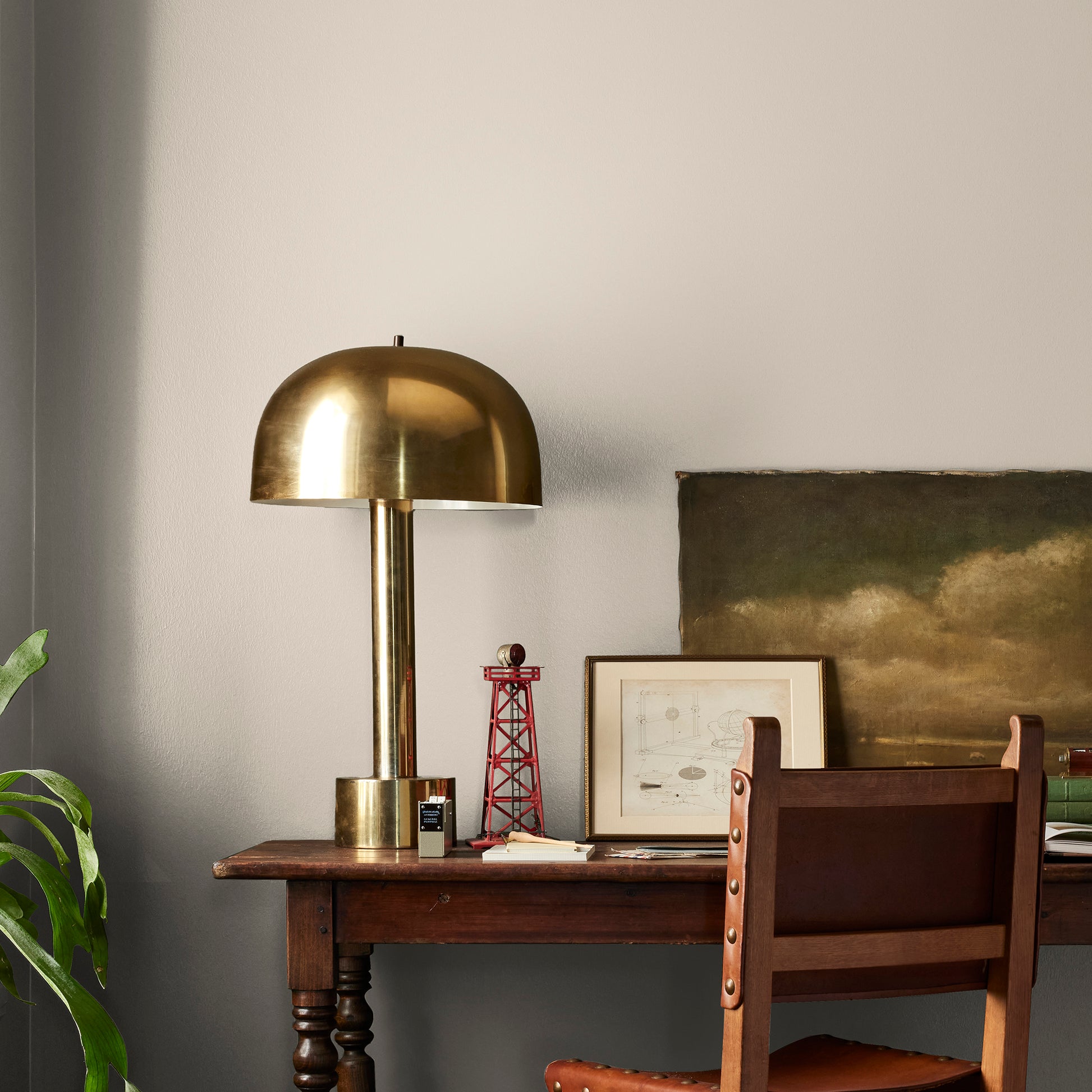 Dusty beige and tan interior paint named southern grown shown painted on bedroom wall