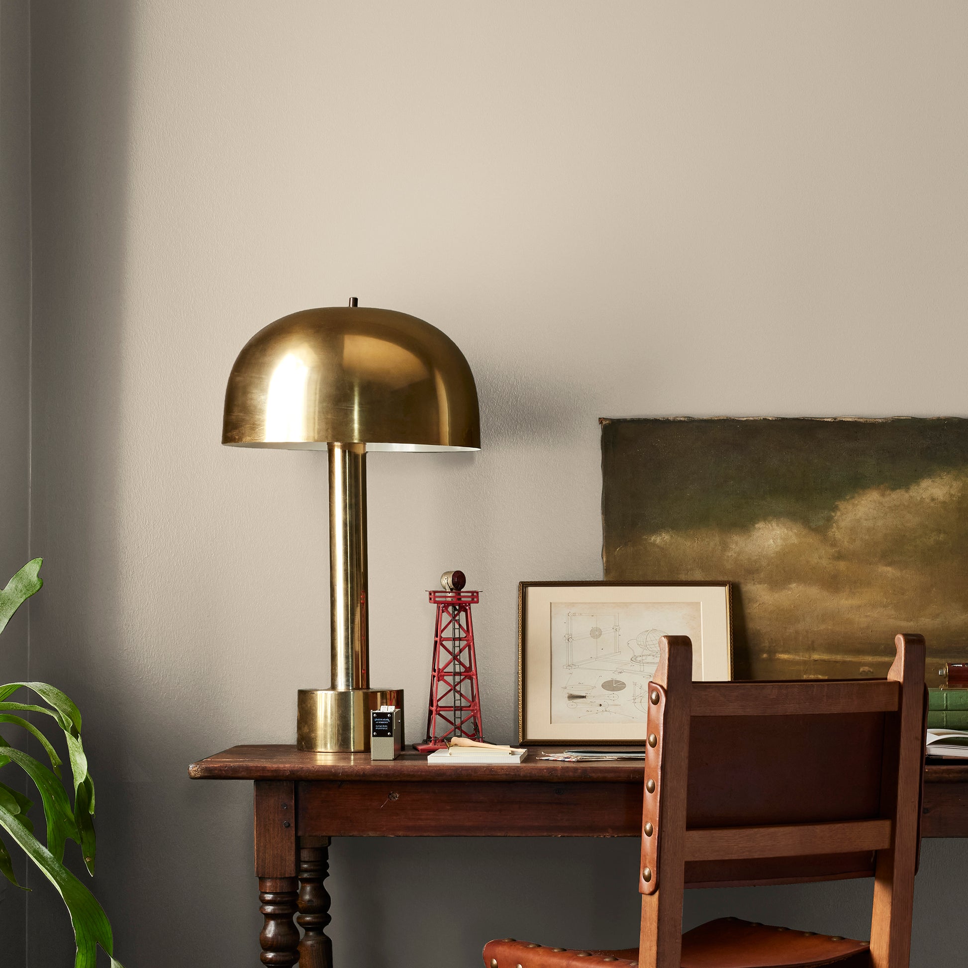 Cool beige dusted with hazel and cocoa interior paint named tapestry thread shown painted on bedroom wall