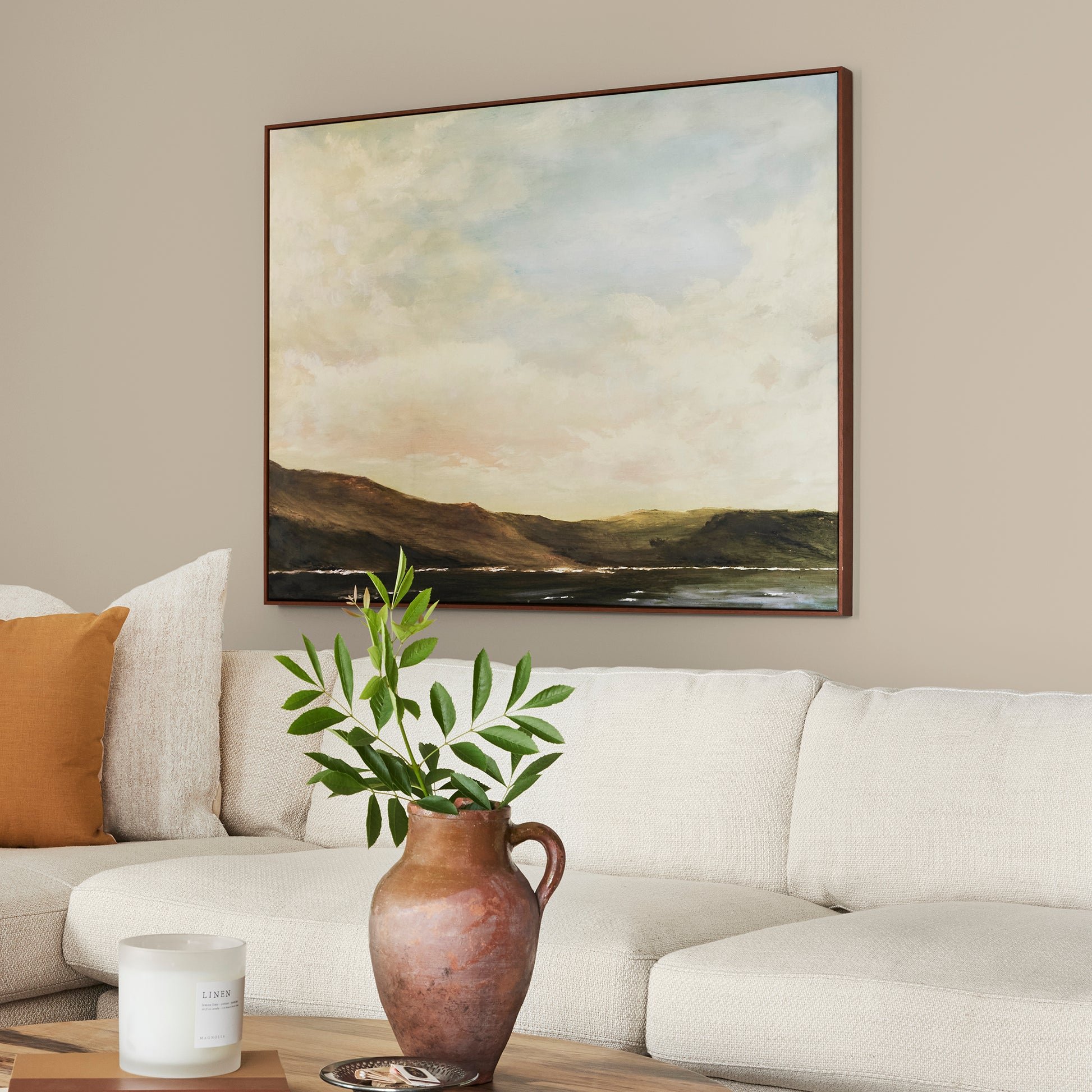 Cool beige dusted with hazel and cocoa interior paint named tapestry thread shown painted on living room wall
