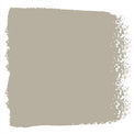 Mid-toned tan with a hint of green paint named renewed