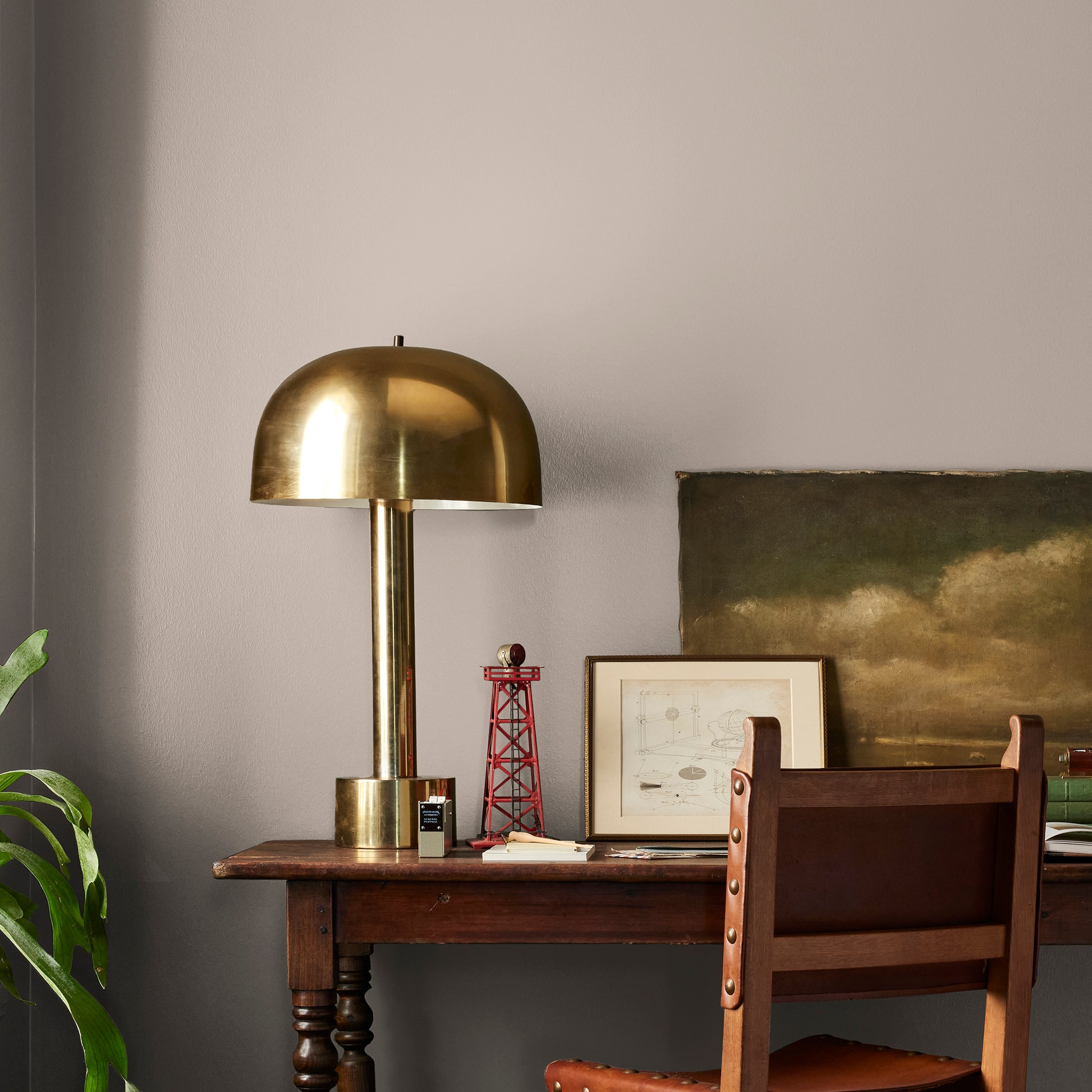 Khaki tan interior paint named rustic oak shown painted on bedroom wall