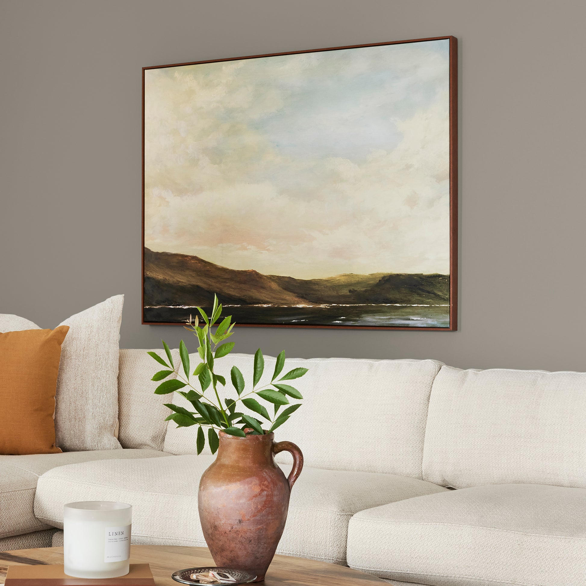 Muted smoky brown interior paint named reclaimed wood shown painted on living room wall