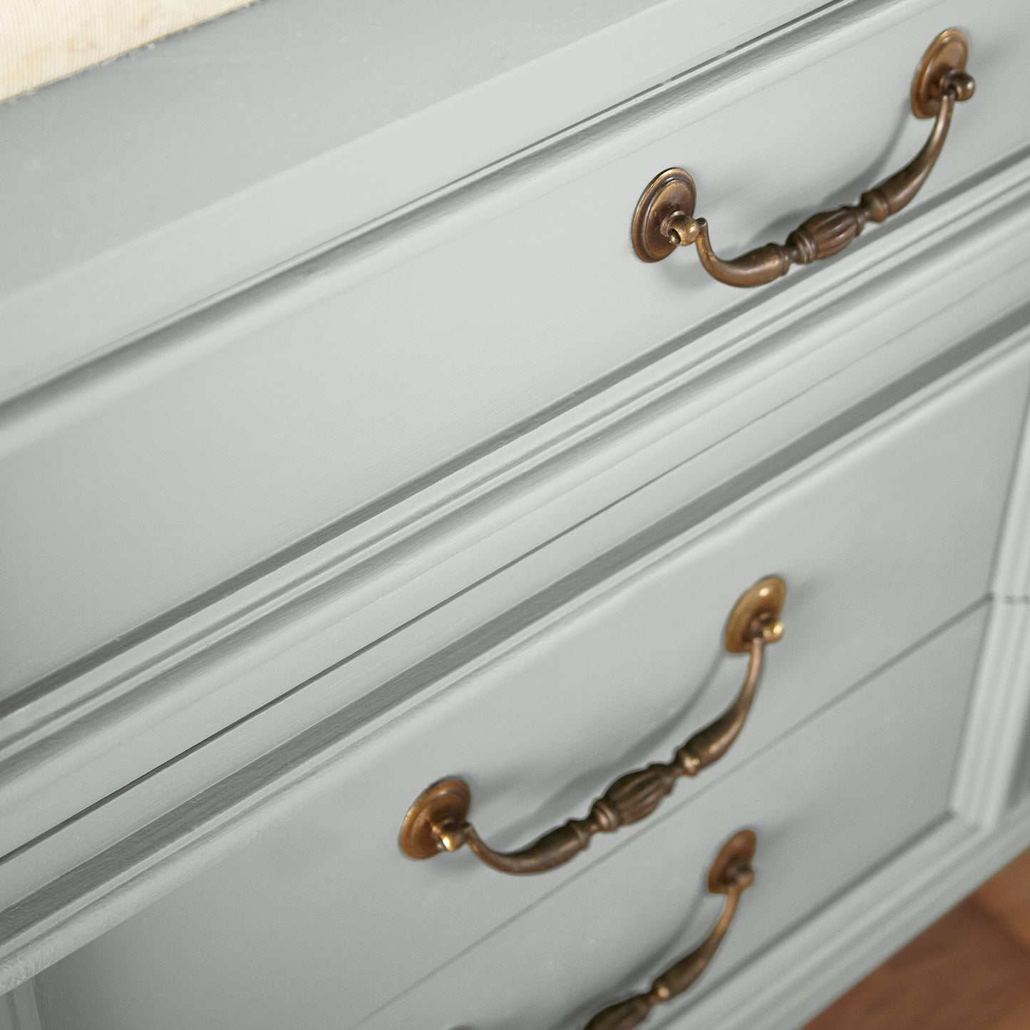 Soft light gray with blue undertone door and cabinet paint named dark moon shown painted on cabinet