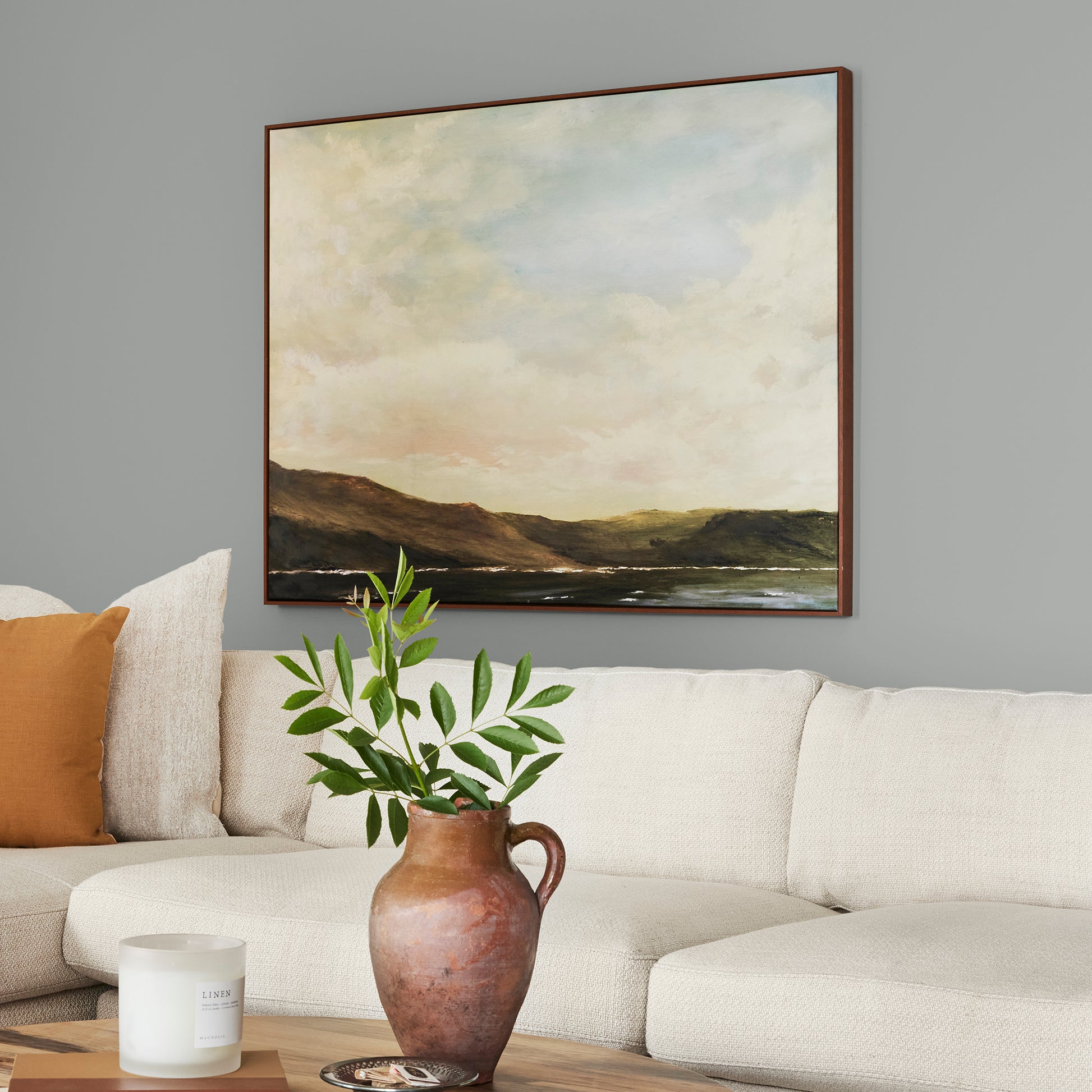 warm charcoal grey interior paint named vintage weathervane shown painted on living room wall