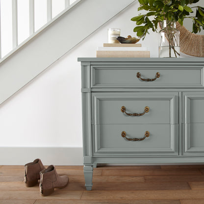 Cement gray with blue undertones door and cabinet paint named clean slate shown painted on entryway cabinet