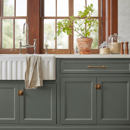Dark hunter green dusted with olive tones door and cabinet paint named locally grown shown painted on kitchen cabinet 