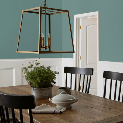 A dark, dusty aqua interior paint named tranquility shown painted on dining room wall