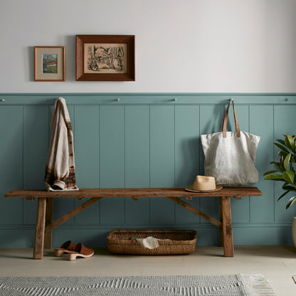 A dark, dusty aqua interior paint named tranquility shown painted on entryway wall