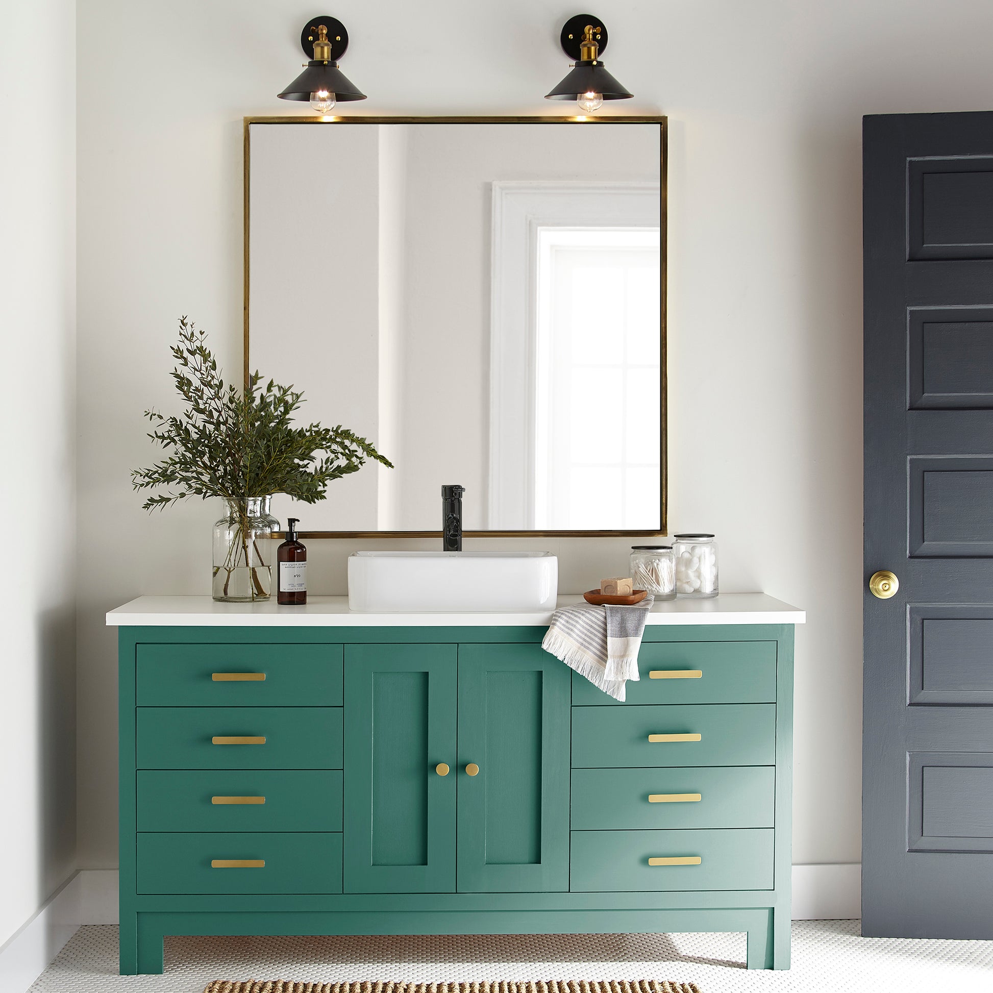 Crisp hunter green with golden accents door and cabinet paint named aspen leaf shown painted on bathroom cabinet