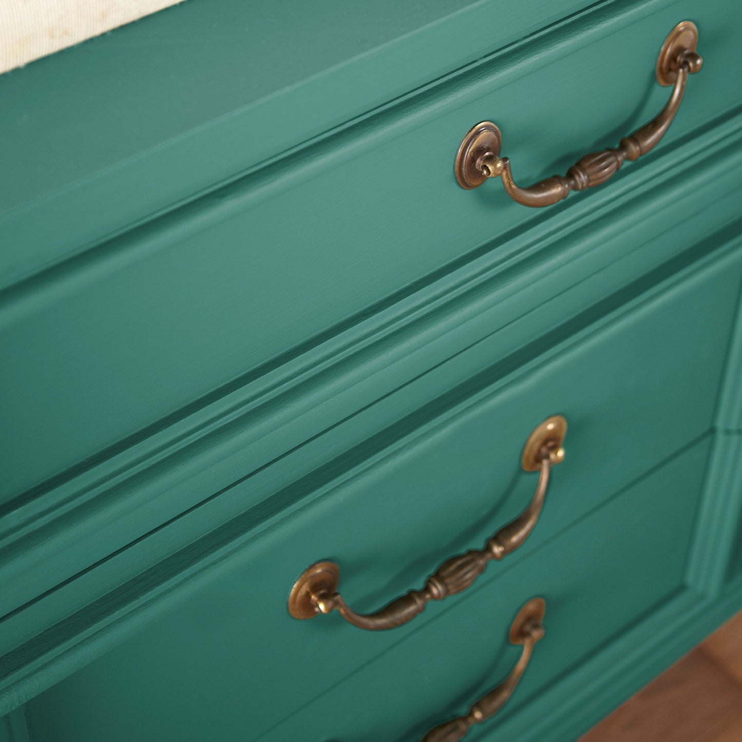 Crisp hunter green with golden accents door and cabinet paint named aspen leaf shown painted on cabinet