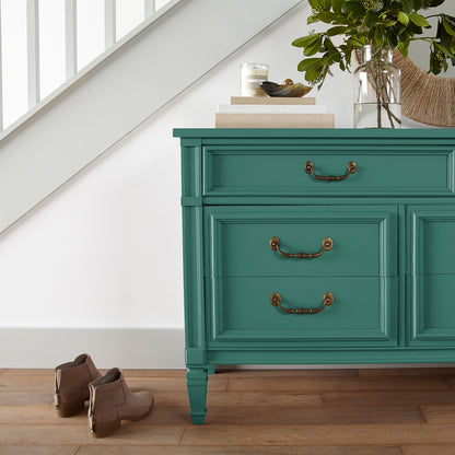 Crisp hunter green with golden accents door and cabinet paint named aspen leaf shown painted on entryway cabinet