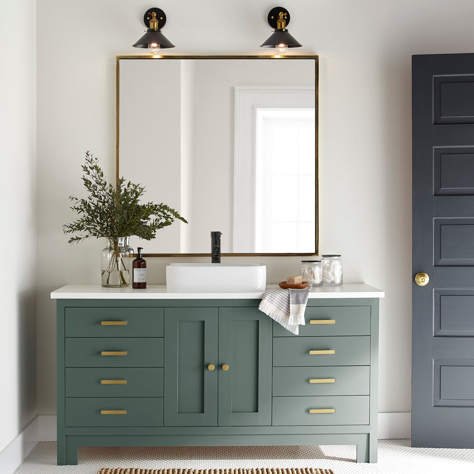 Deep hunter green comparable to pine tree leaves door and cabinet paint named regal leaf shown painted on bathroom cabinet