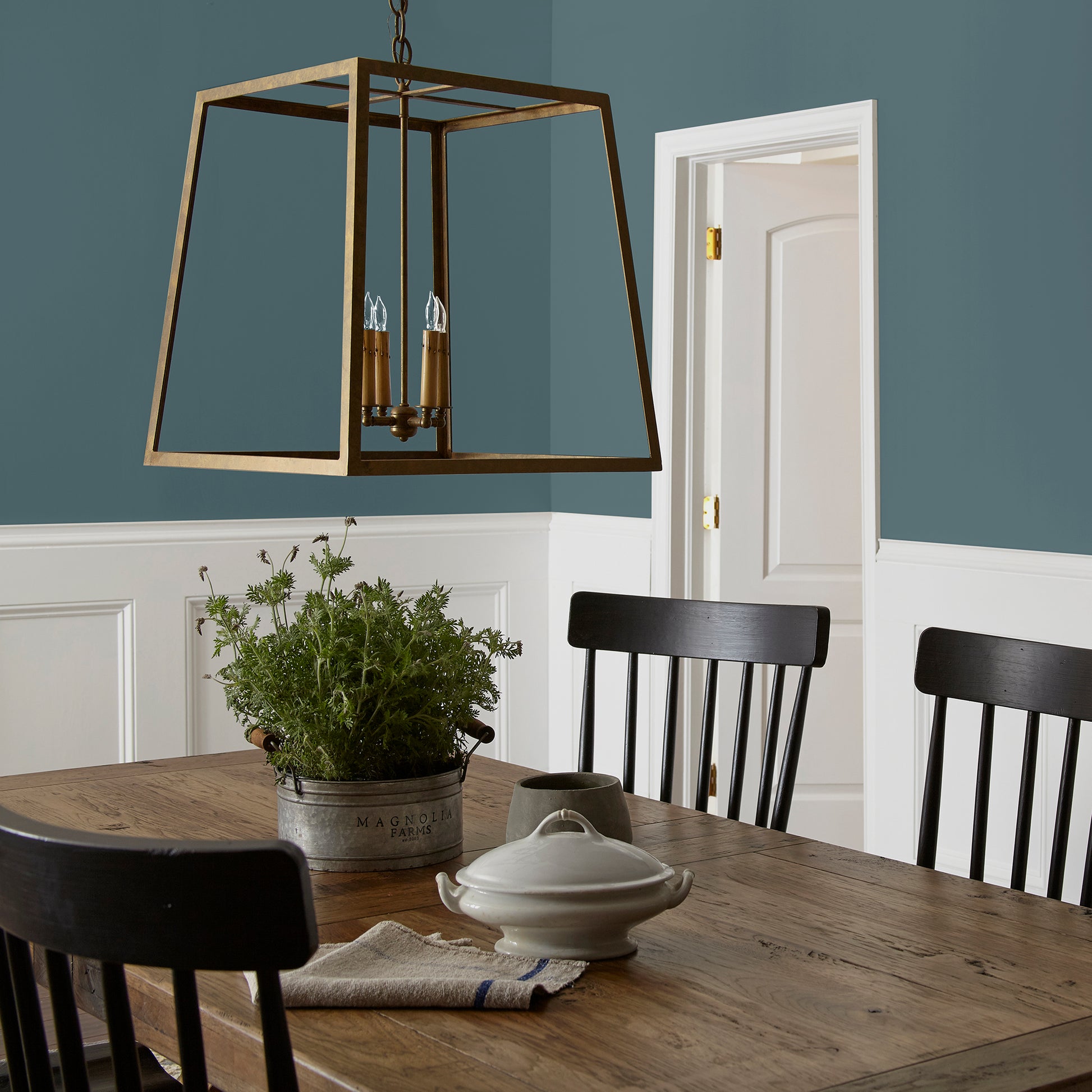 Deep sea blue interior paint named together shown painted on dining room wall