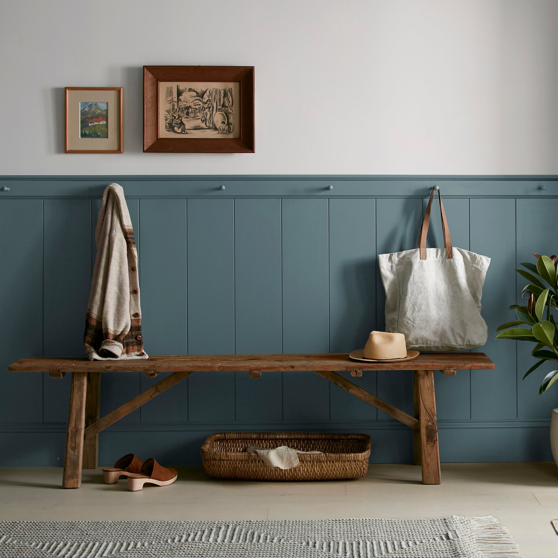 Deep sea blue interior paint named together shown painted on entryway wall