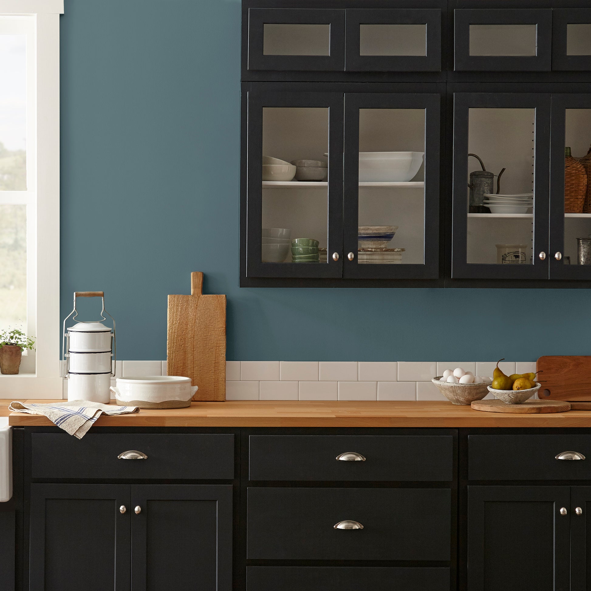 Deep sea blue interior paint named together shown painted on kitchen wall