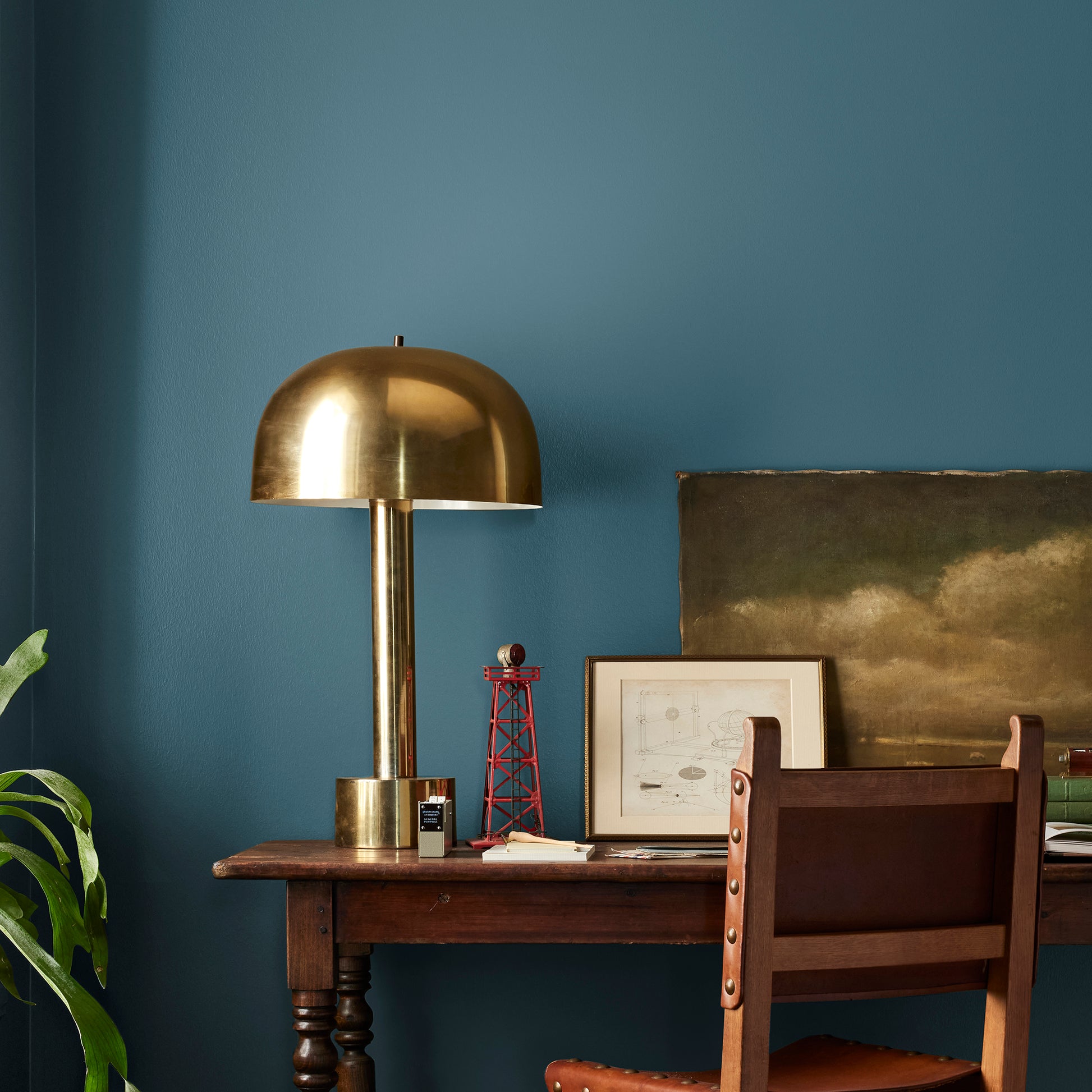 Deep denim blue interior paint named signature shown painted on bedroom wall