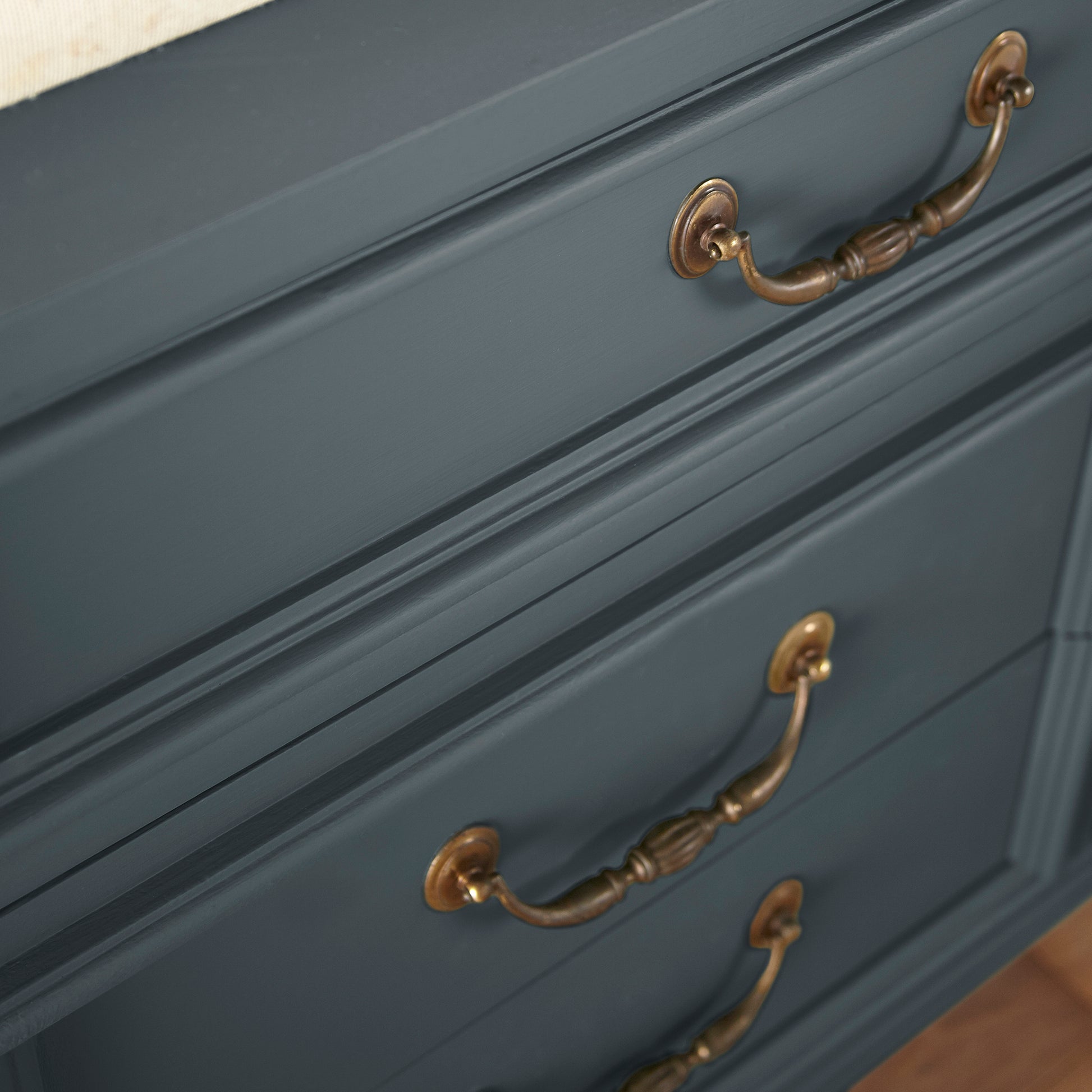Almost black with dark blue undertones door and cabinet paint named arches shown painted on cabinet