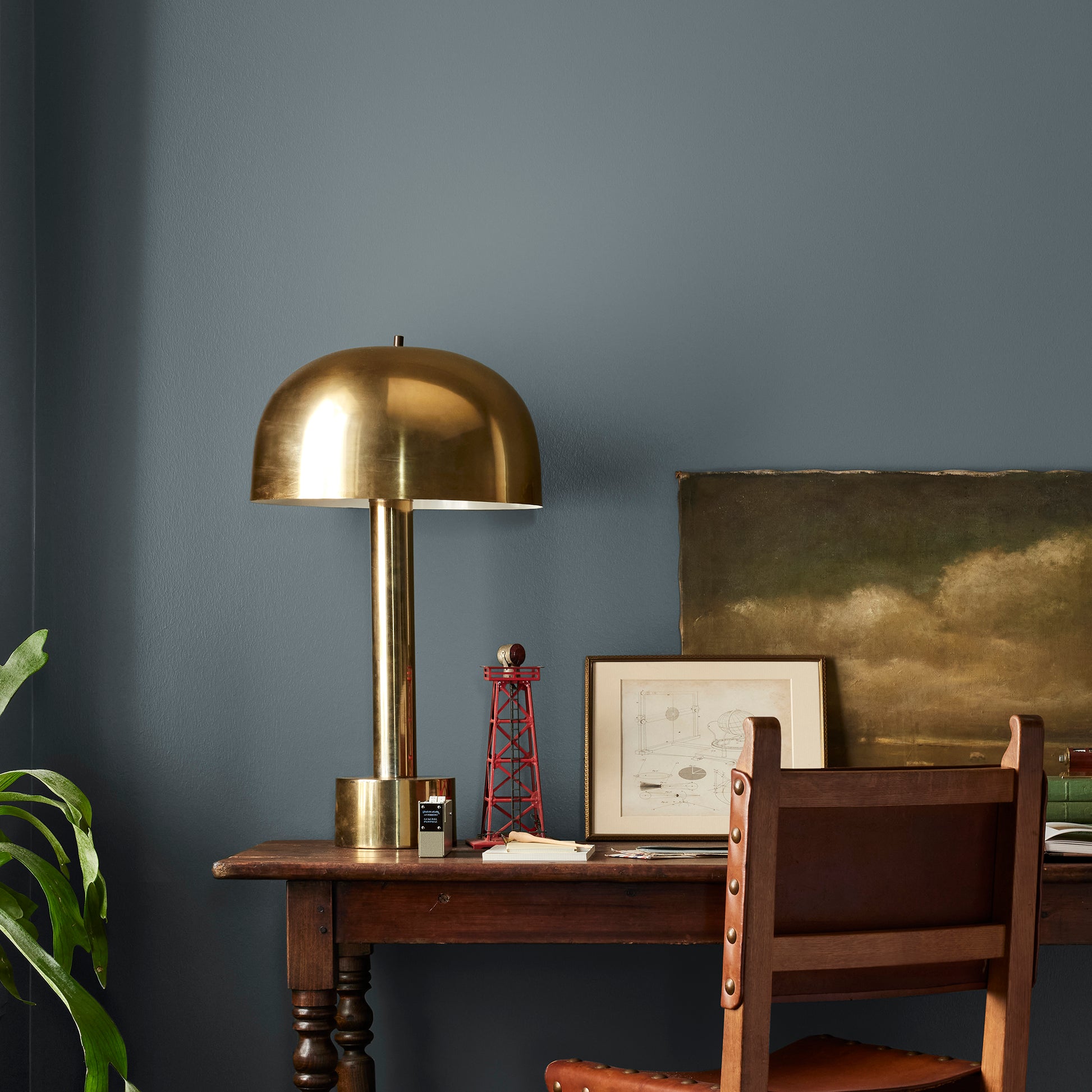 smoky grey paint with blue undertones named coffee nook shown painted on bedroom wall