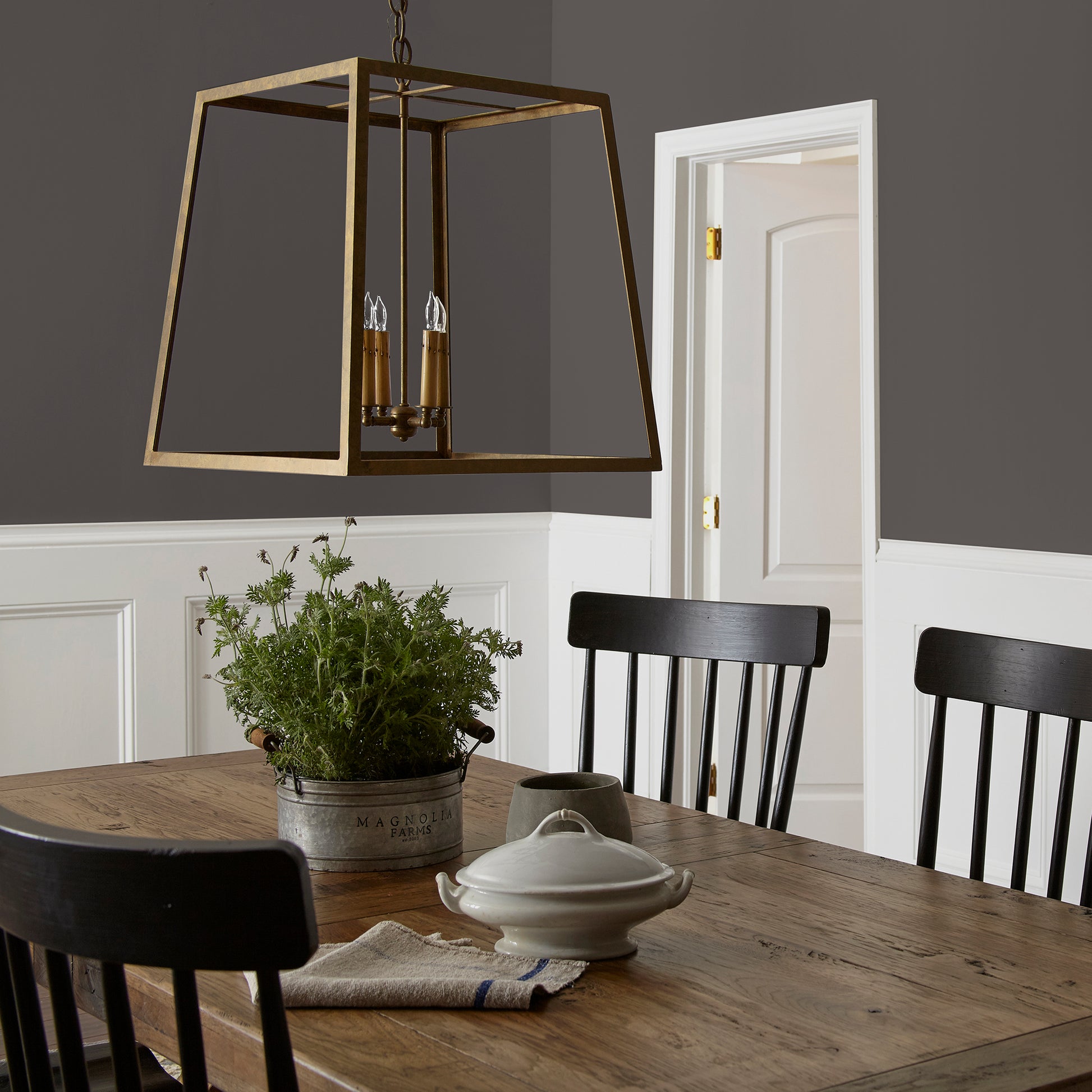 Dark chocolate brown interior paint named moments shown painted on dining room wall