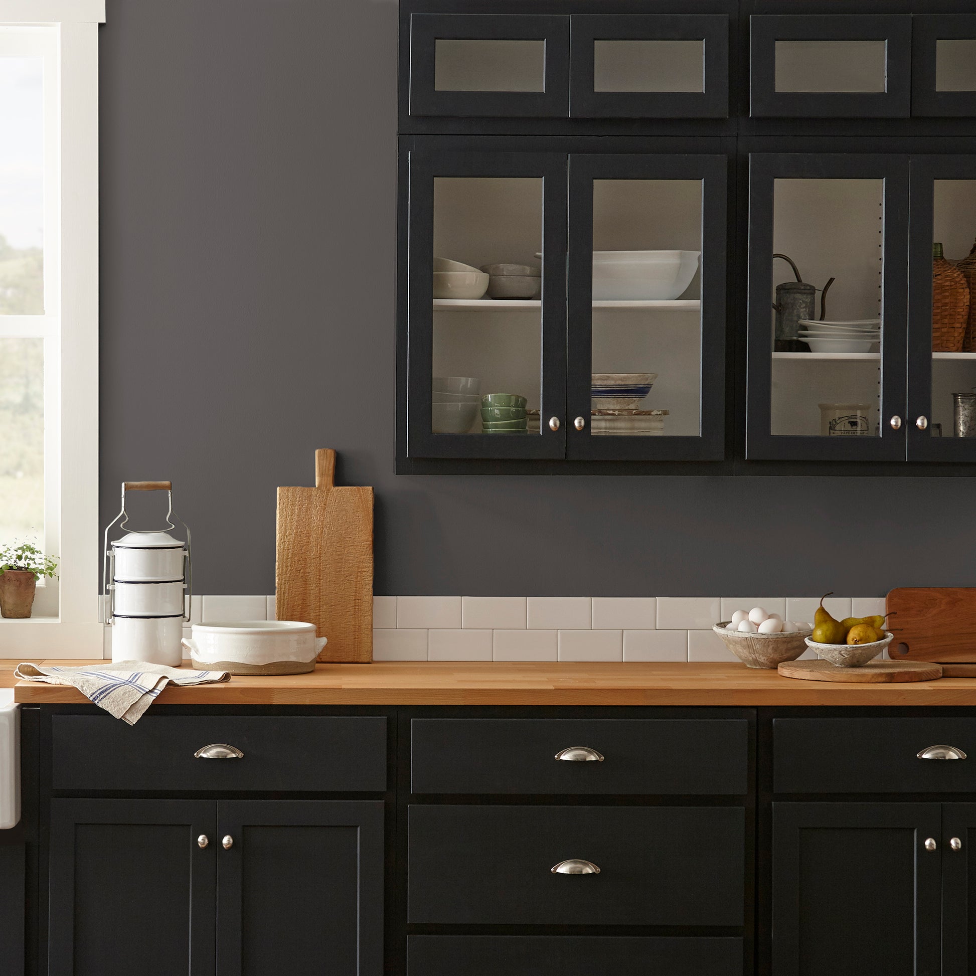 Dark chocolate brown interior paint named moments shown painted on kitchen wall