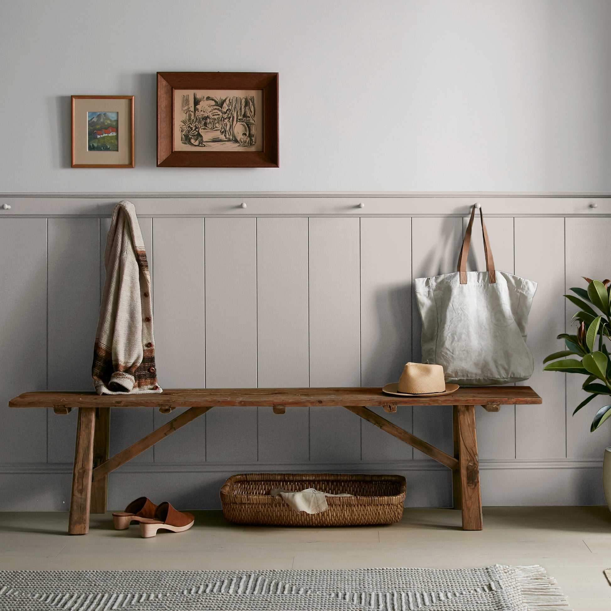 Soft tan with notes of gray interior paint named anatolian shown painted on entryway wall