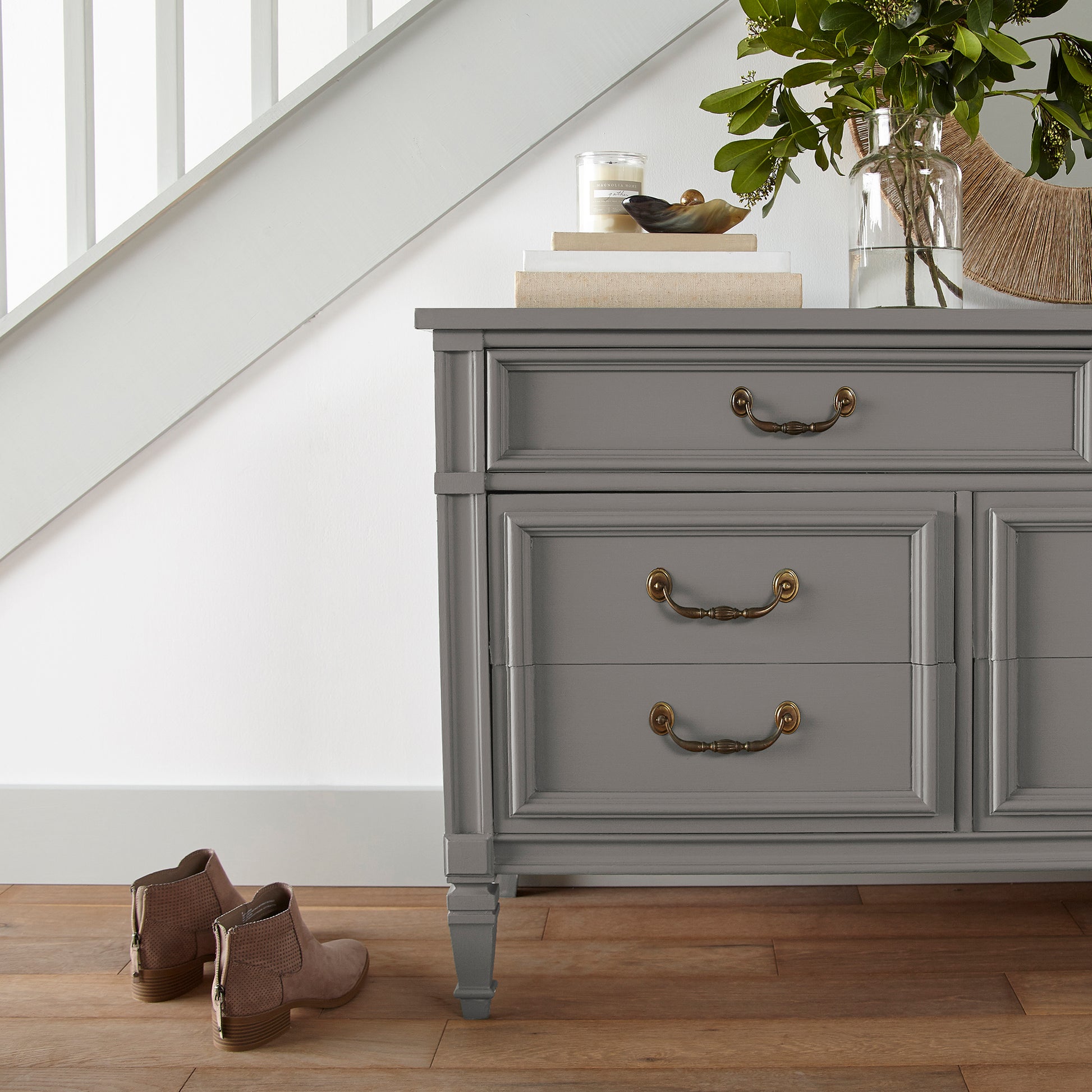 Smoky mid-toned brown door and cabinet paint named nesting box shown painted on entryway cabinet