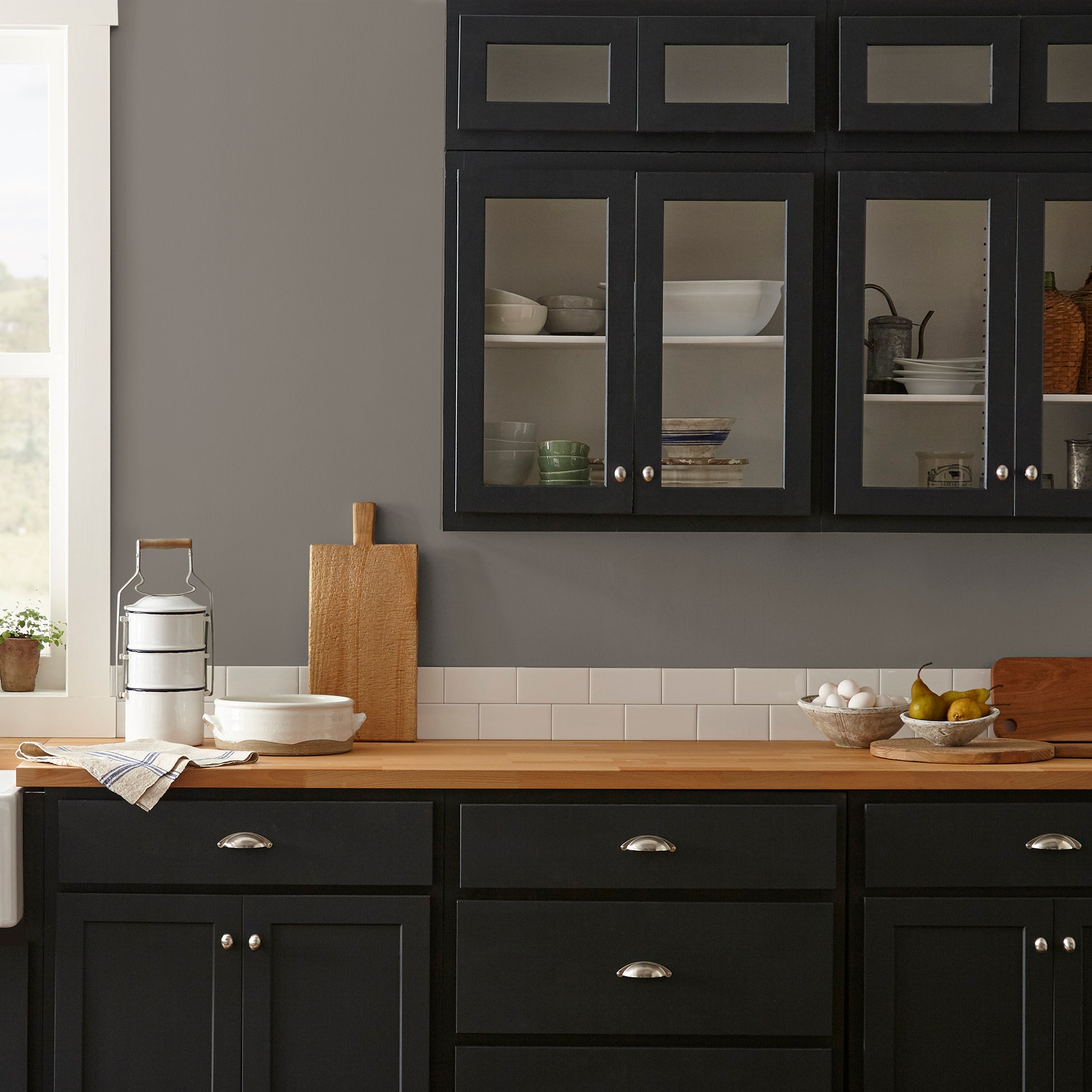 Rich earthy brown paint named Rocking Horse shown painted on kitchen wall