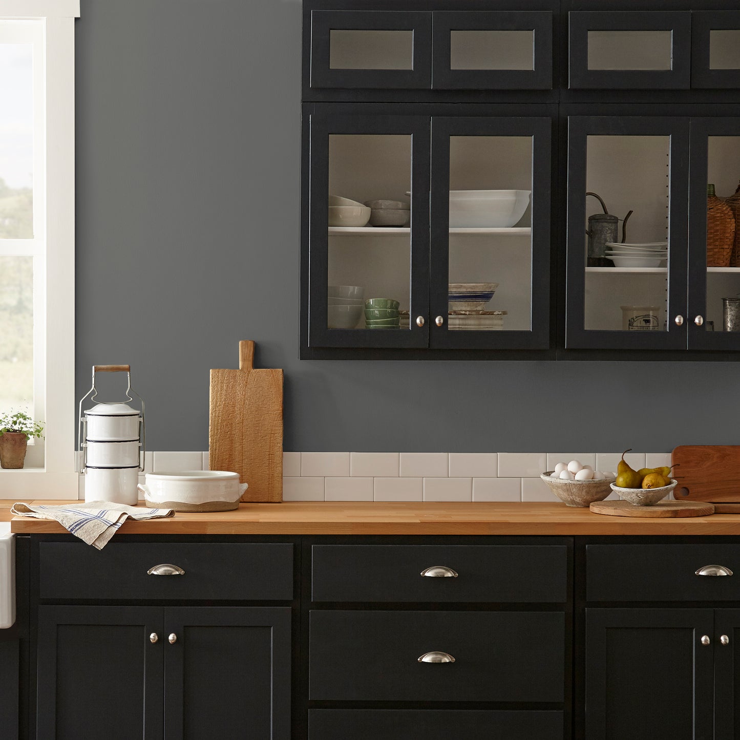 Almost black with green undertones interior paint named prairie smoke shown painted on kitchen wall