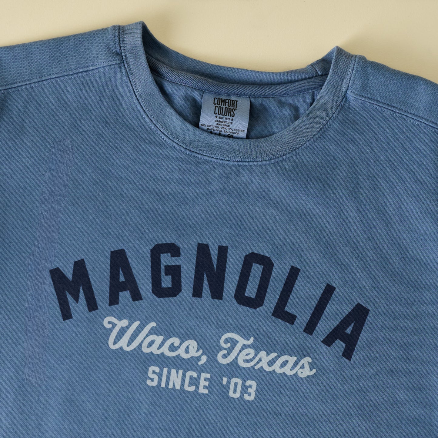 Magnolia Arched Blue Sweatshirt close up view