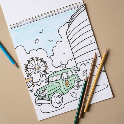 Magnolia Coloring Book open to a page with a car 