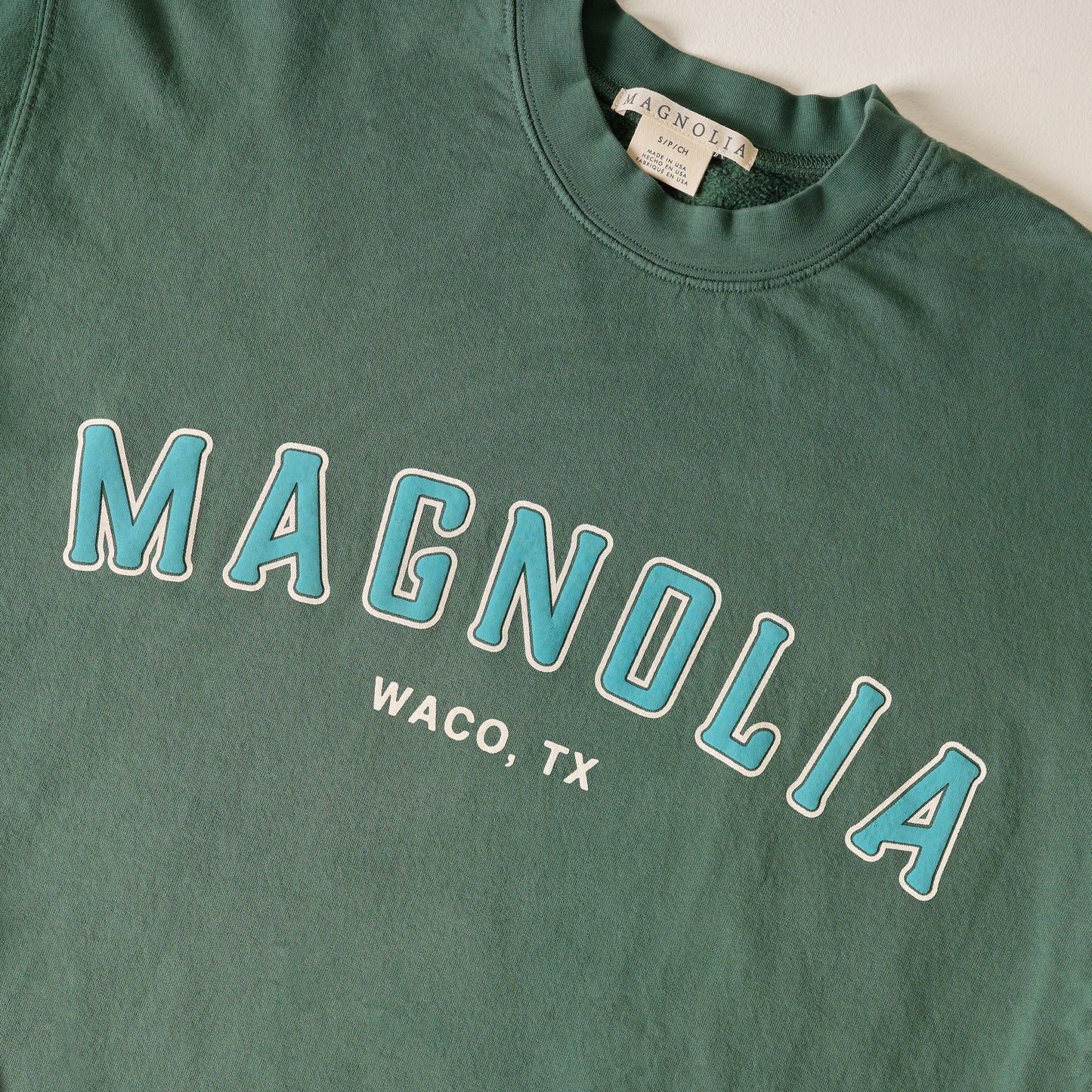 Magnolia Hunter Green Sweatshirt up close