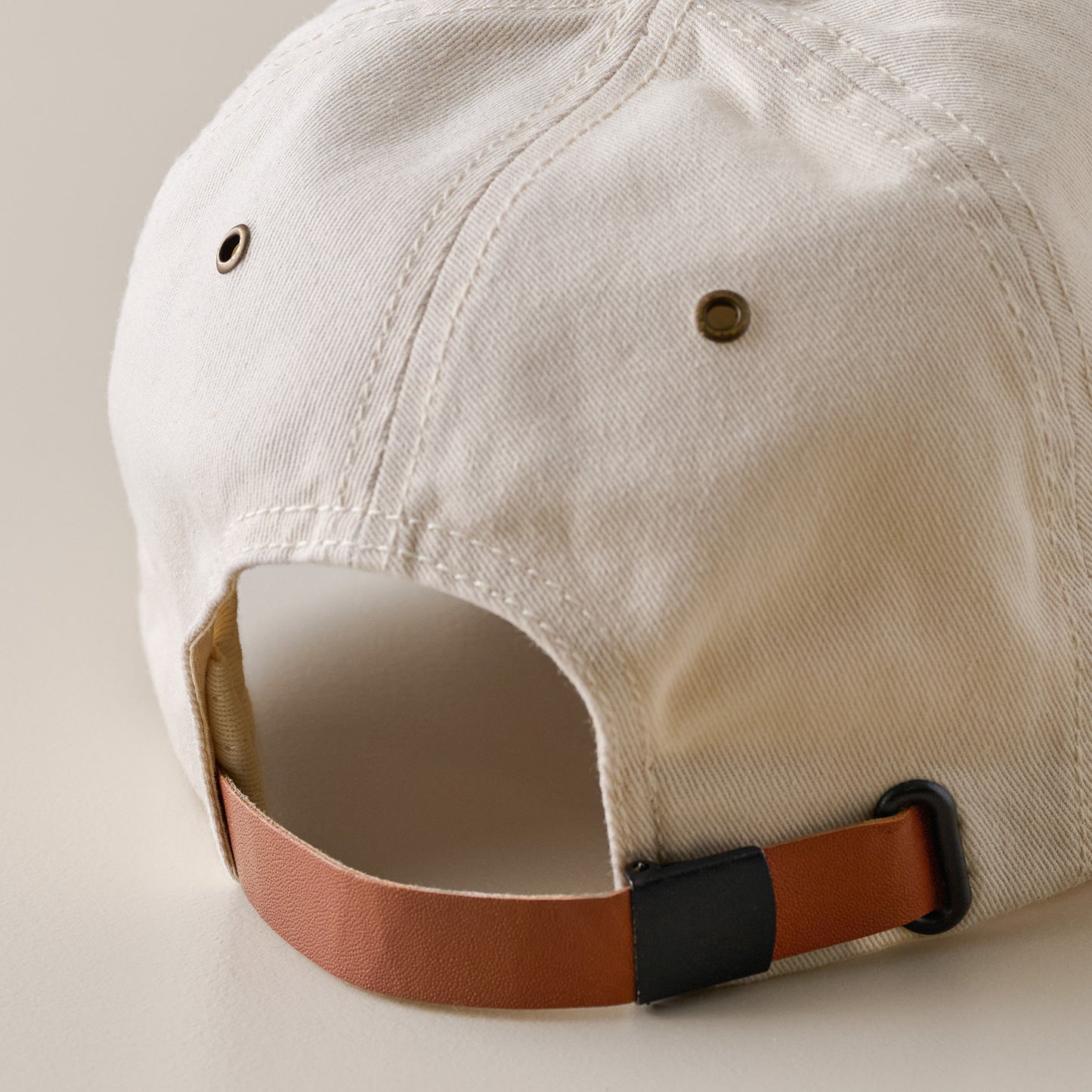 Magnolia Ivory Twill Dad Cap closure up close