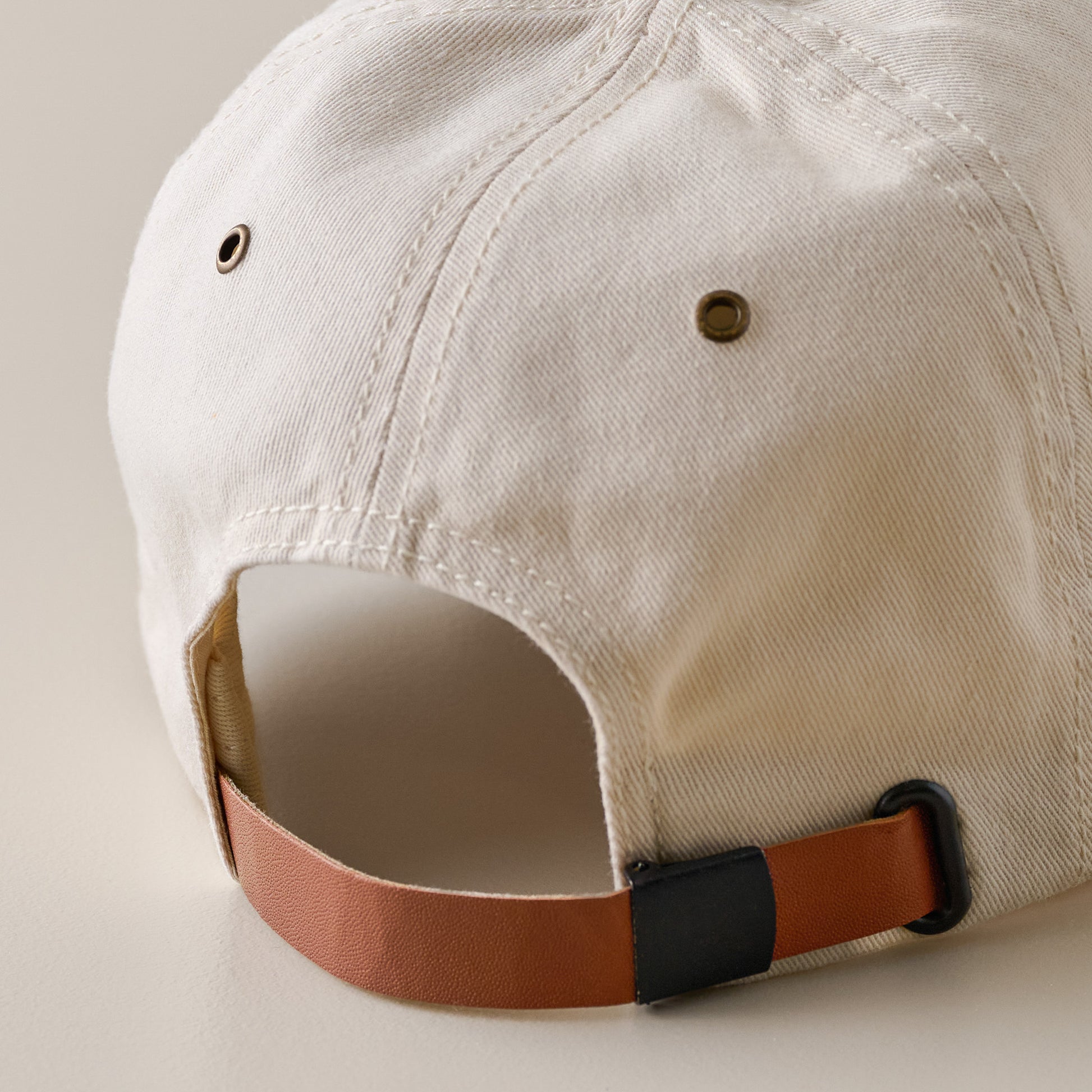 Magnolia Ivory Twill Dad Cap closure up close